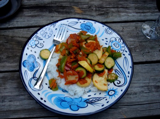 A typical no-meat meal: stir fried squash, carrots, bell pepper, zucchini, carrots, and okra with garlic, red pepper, thai basil, lime juice, and soy sauce.