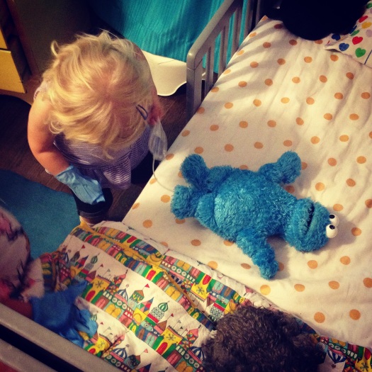 Using catheters: part of life for most people with SB. Claire's helping Cookie Monster out with his cath.