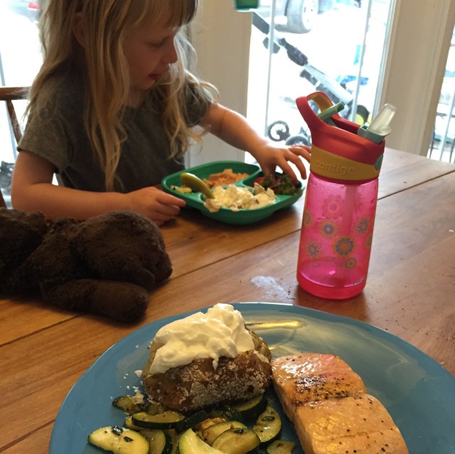 This was supposed to be tuna cakes, grits, and zucchini. Instead it became salmon filets, baked potatoes and zucchini. The tuna will keep in the pantry for another day.